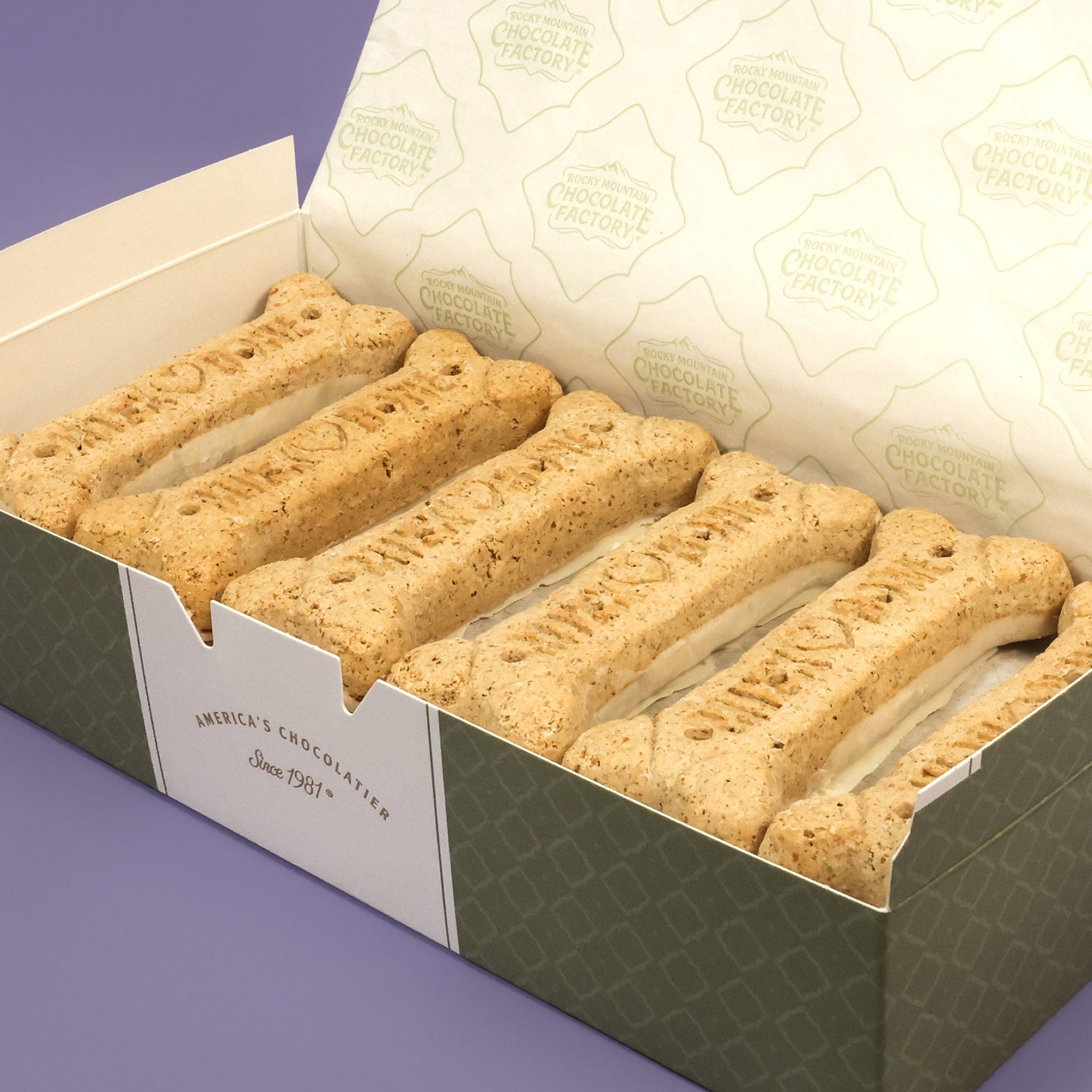 Barker’s Dozen, 12 large bone-shaped treats dipped in dog-safe white confection