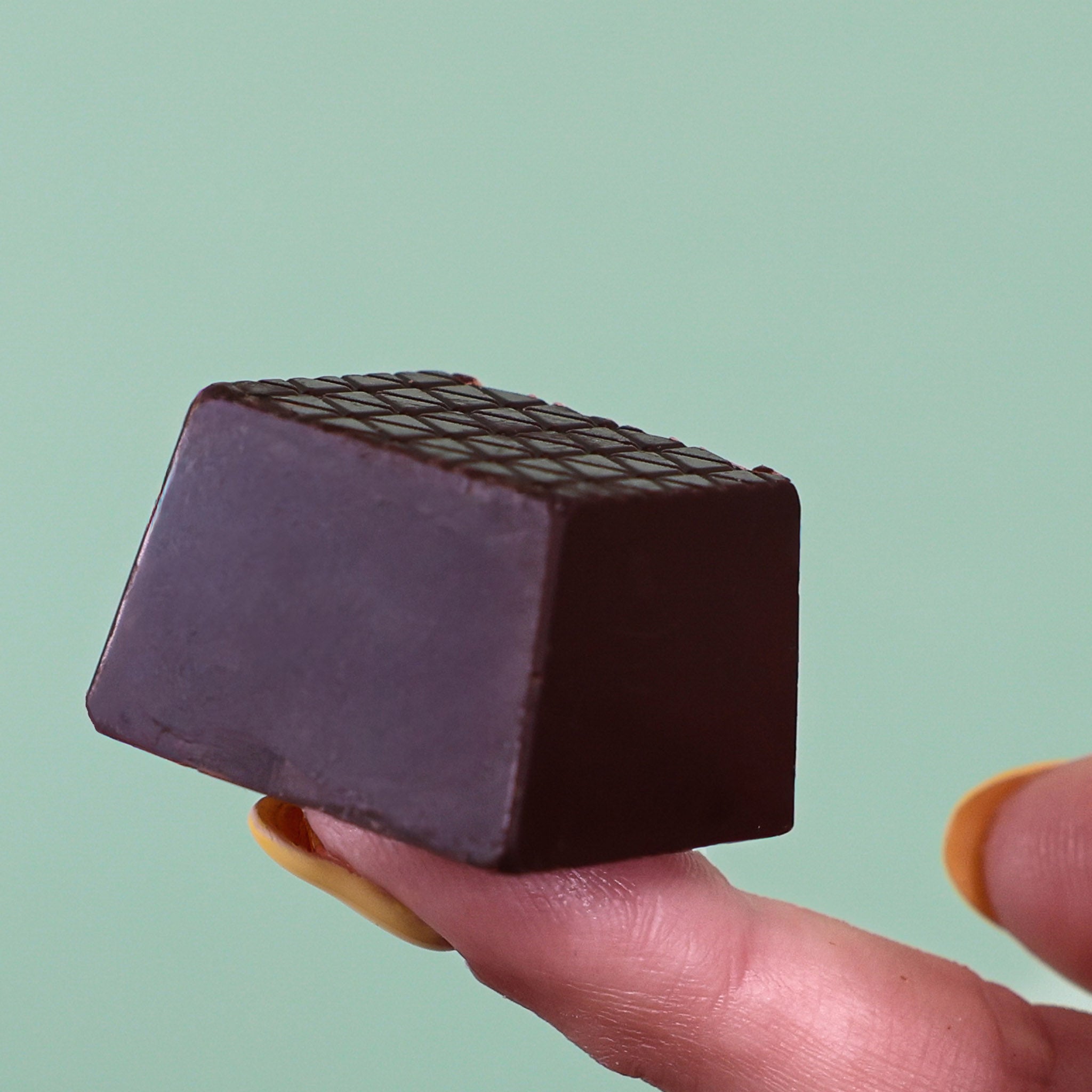 Dark Chocolate Lemon Truffle Square by Rocky Mountain Chocolate Factory closeup image